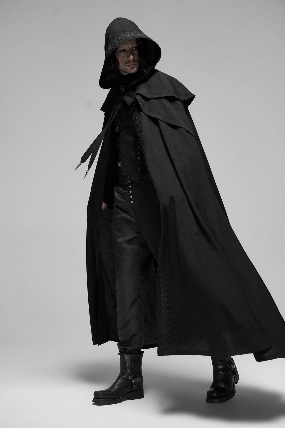 Model wearing an elegant black Rococo long cloak with cascading shoulders, showcasing a dramatic and stylish look.
