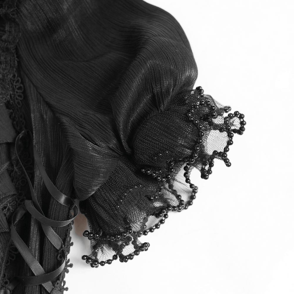 Close-up of the Elegant Ruffle Blouse with Sheer Yoke and Lace-Up Sides showcasing intricate lace detailing.