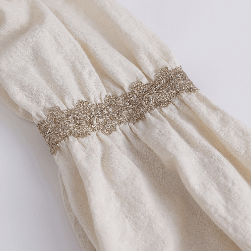 Elegant off-white cotton shirt with delicate ruffle and beautiful lace detailing, perfect for vintage-inspired fashion.