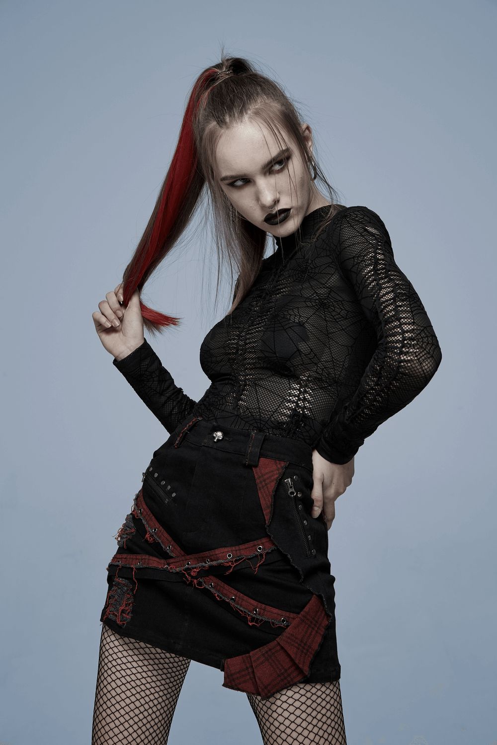 Gothic sheer long sleeve mesh top with spiderweb design and edgy black skirt, perfect for a dark fairy look.
