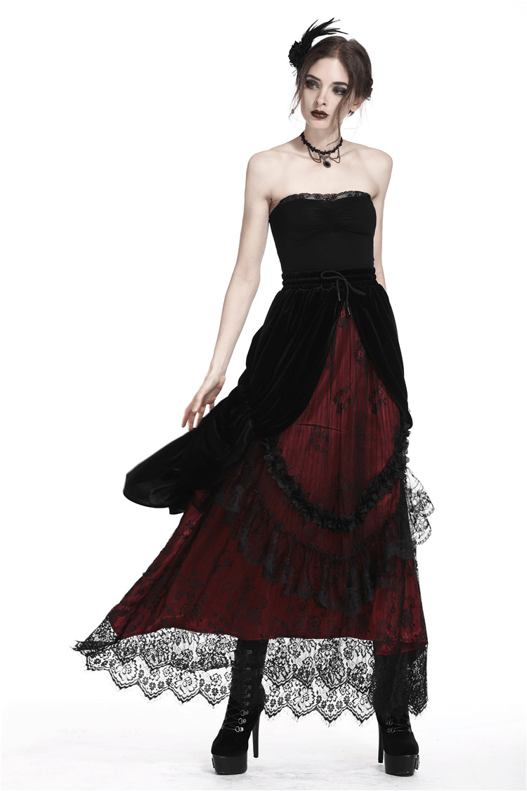 Victorian-inspired long skirt with red and black lace, perfect for a gothic look, flowing elegantly on a model.
