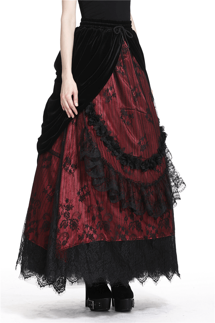 Elegant steampunk black velvet and red lace long skirt for women, showcasing a Victorian-inspired design.