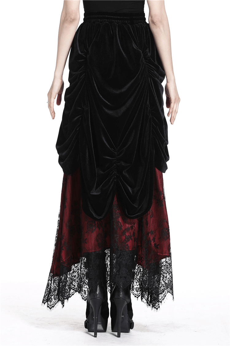 Back view of an elegant black velvet and red lace layered skirt for women with high-waisted design.