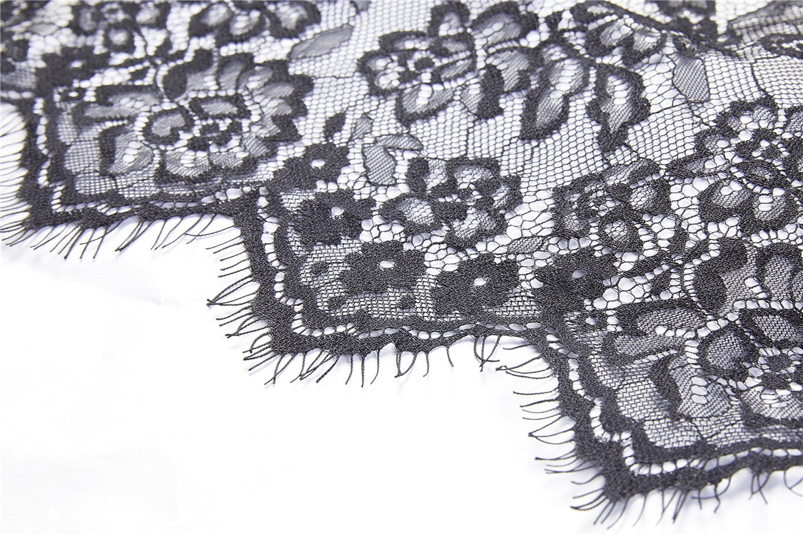 Black floral lace detail for elegant steampunk fashion and Victorian-inspired clothing.