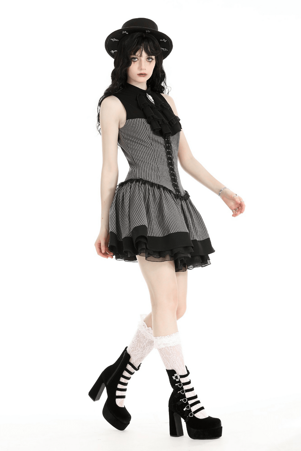 Elegant striped ruffle dress with brooch accent and gothic flair, perfect for making a fashion statement.