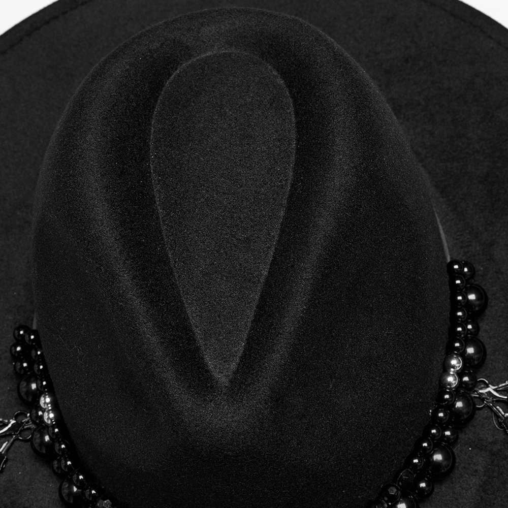 Elegant black suede hat top featuring retro pearl accents and Gothic design elements. Perfect for a bold fashion statement.