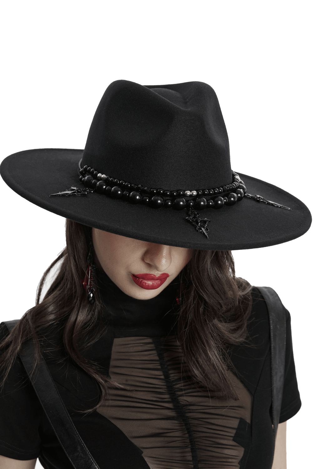 Elegant black wide-brim hat with gothic pearl accents, styled for a bold fashion statement.