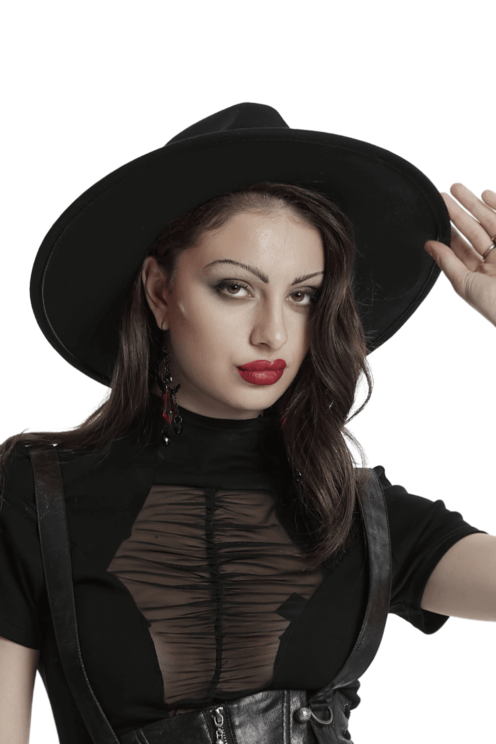 Stylish model wearing a wide-brim black suede hat, showcasing gothic elegance and bold fashion sense.