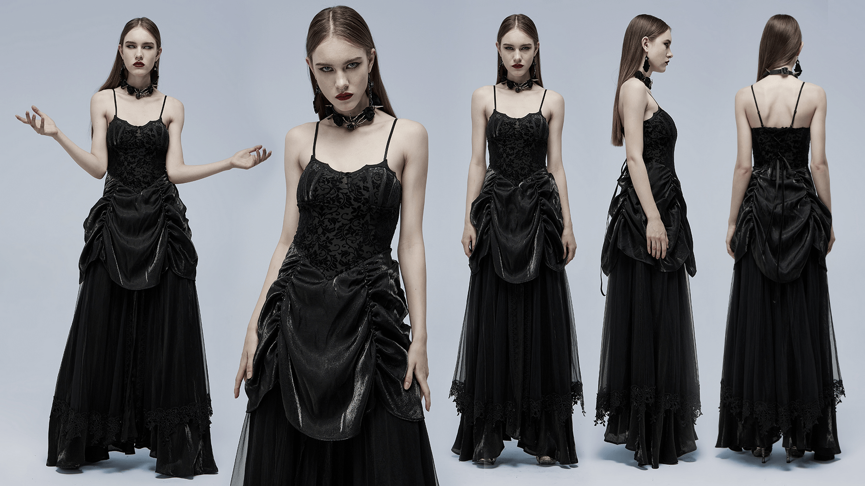 Elegant black gothic gown featuring tulle, velvet, and bat motif, perfect for a dramatic bridal look.