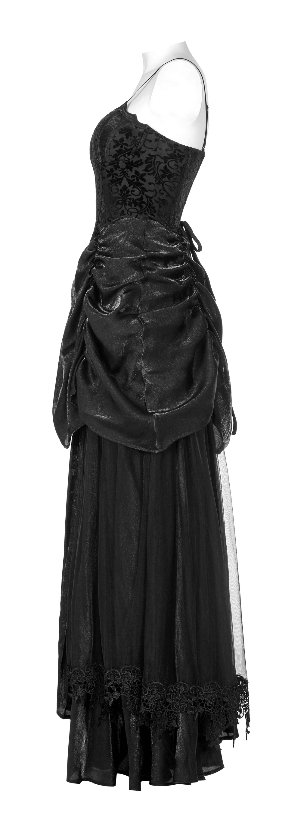 Elegant gothic gown in black tulle and velvet, featuring bat motif and dramatic bustle detail.