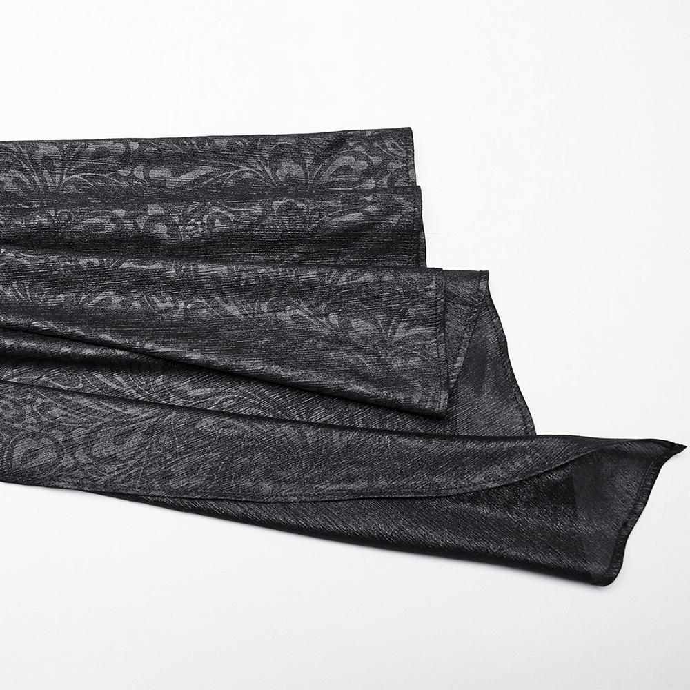 Elegant black chiffon fabric with subtle floral patterns, perfect for gothic-inspired clothing.