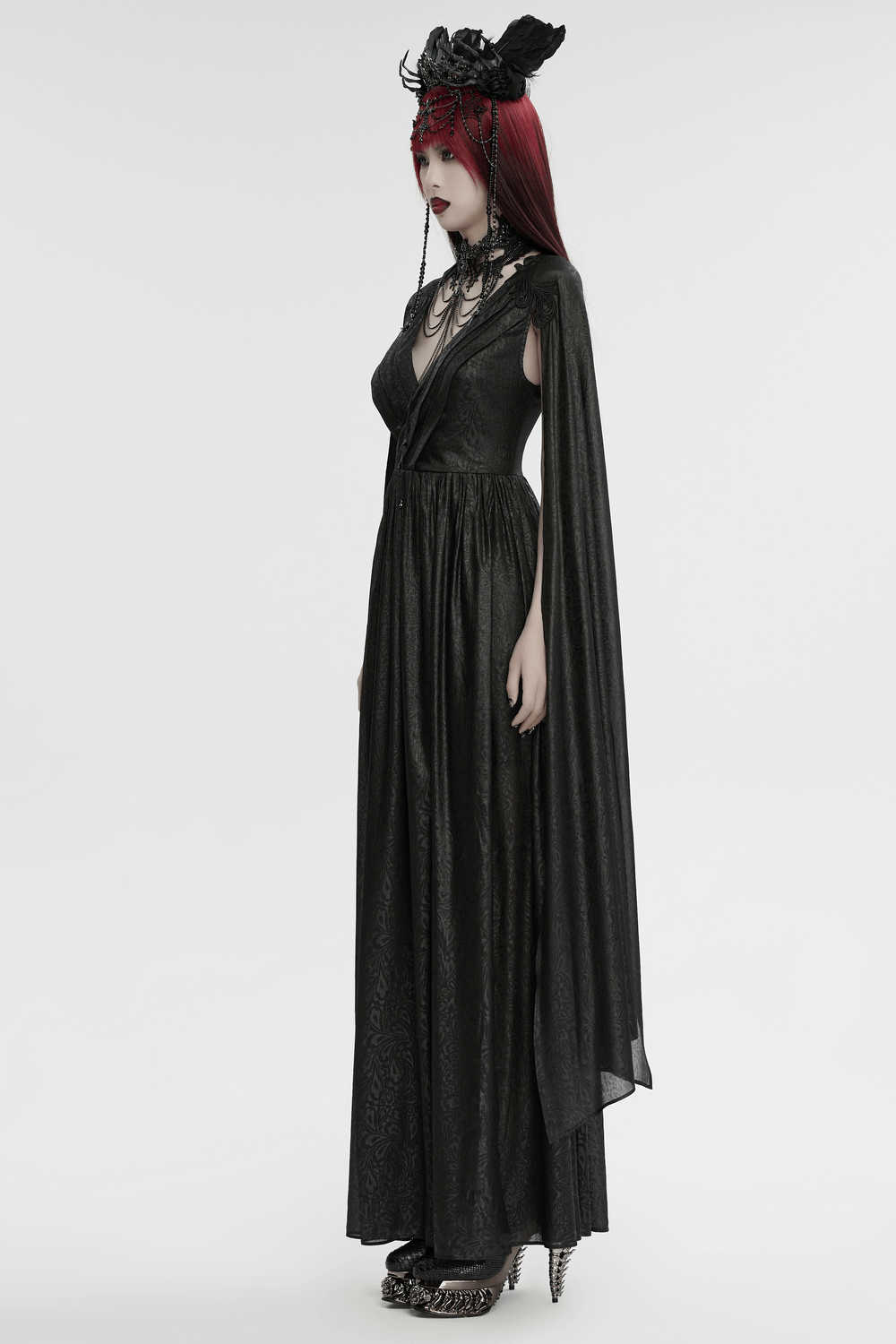 Elegant black chiffon V-neck dress with dramatic cape sleeves, perfect for gothic-inspired fashion lovers.