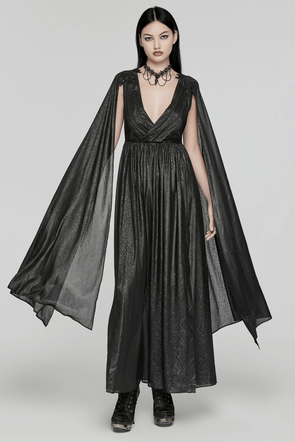 Elegant black chiffon dress with cape sleeves, perfect for gothic-inspired fashion lovers.