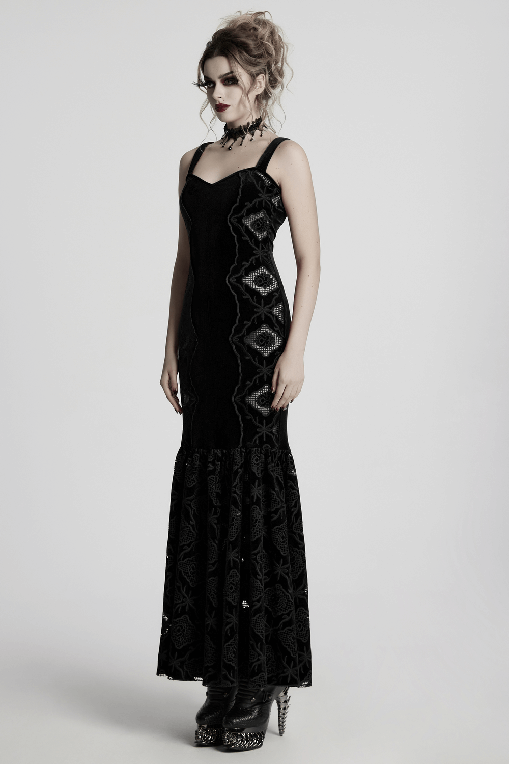 Elegant gothic velvet embroidered dress with pleated hem, showcasing a vintage silhouette and luxurious design.