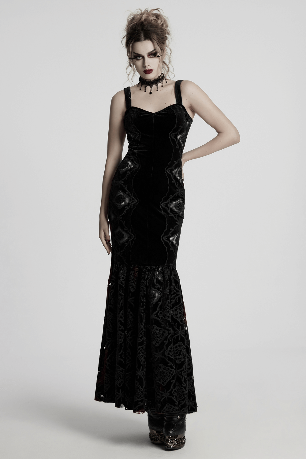 Elegant vintage gothic velvet embroidered dress with pleated hem, showcasing a chic silhouette and alluring design.