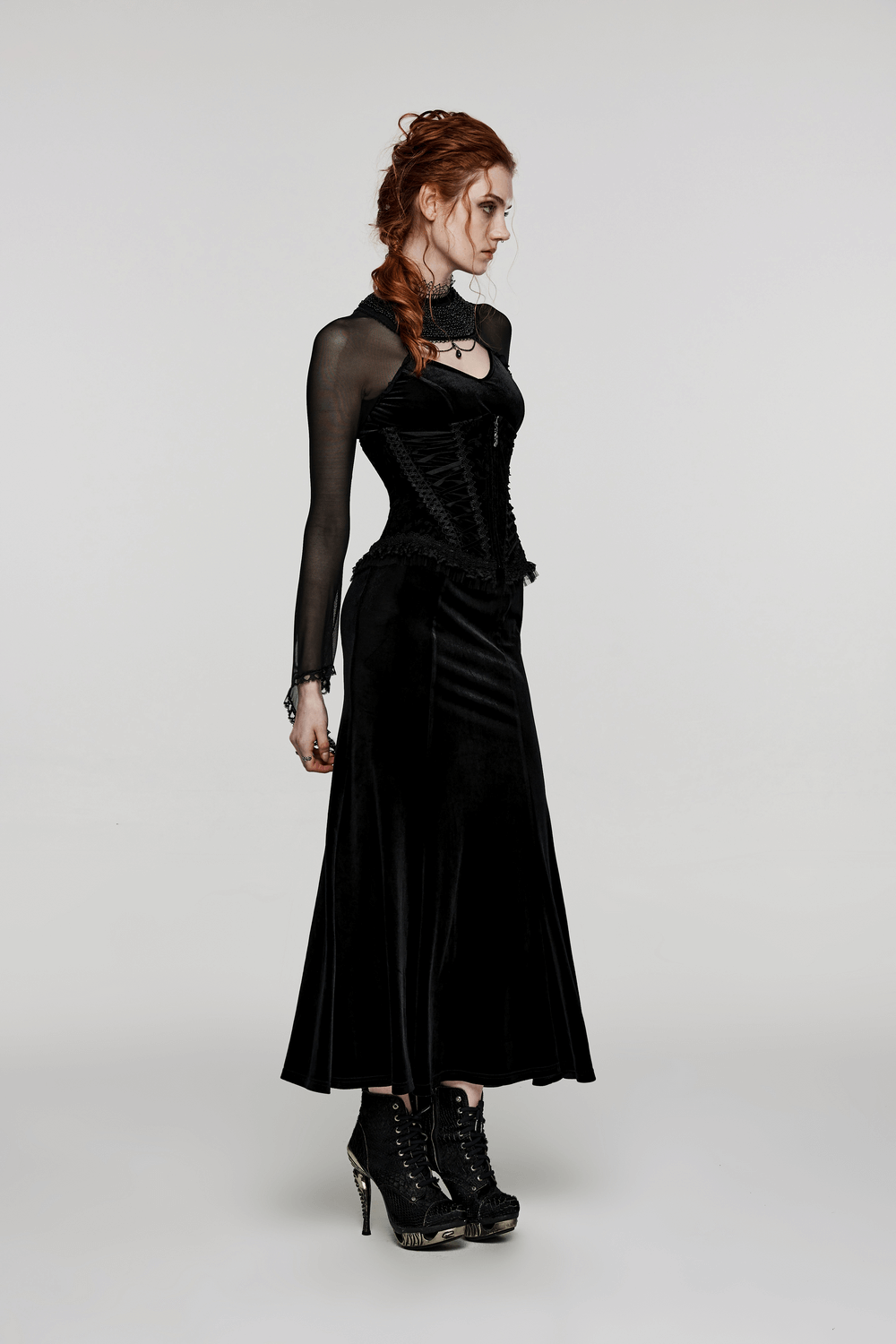 Elegant velvet goth corset with lace details, featuring a chic silhouette and stylish black fabric.
