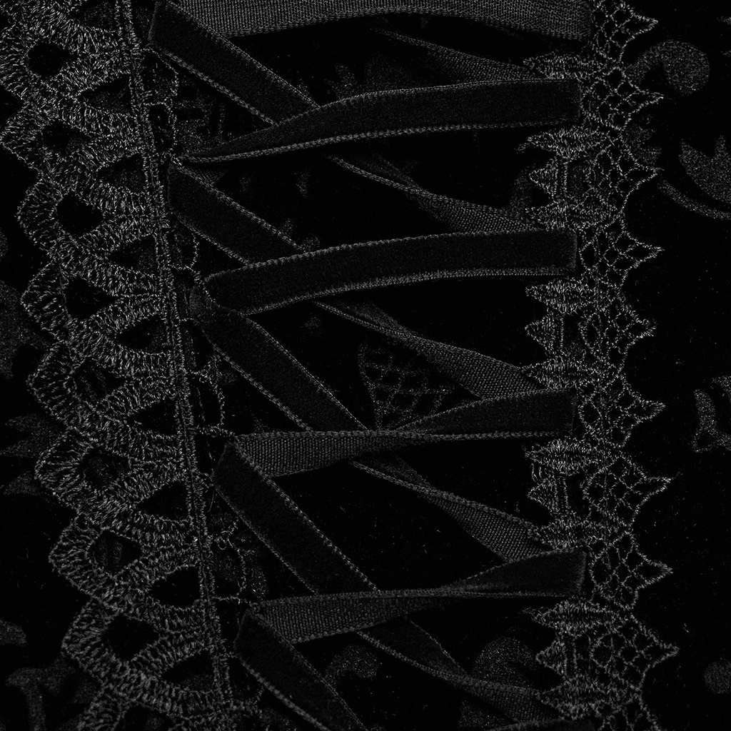Close-up of black velvet goth corset lace detailing and lace-up design for a chic, elegant look.