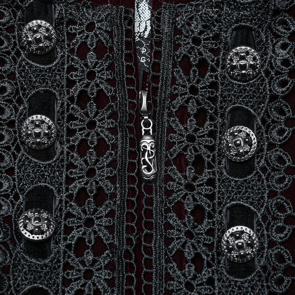 Close-up of ornate lace and ornate button accents on a Gothic velvet coat, showcasing exquisite detailing.