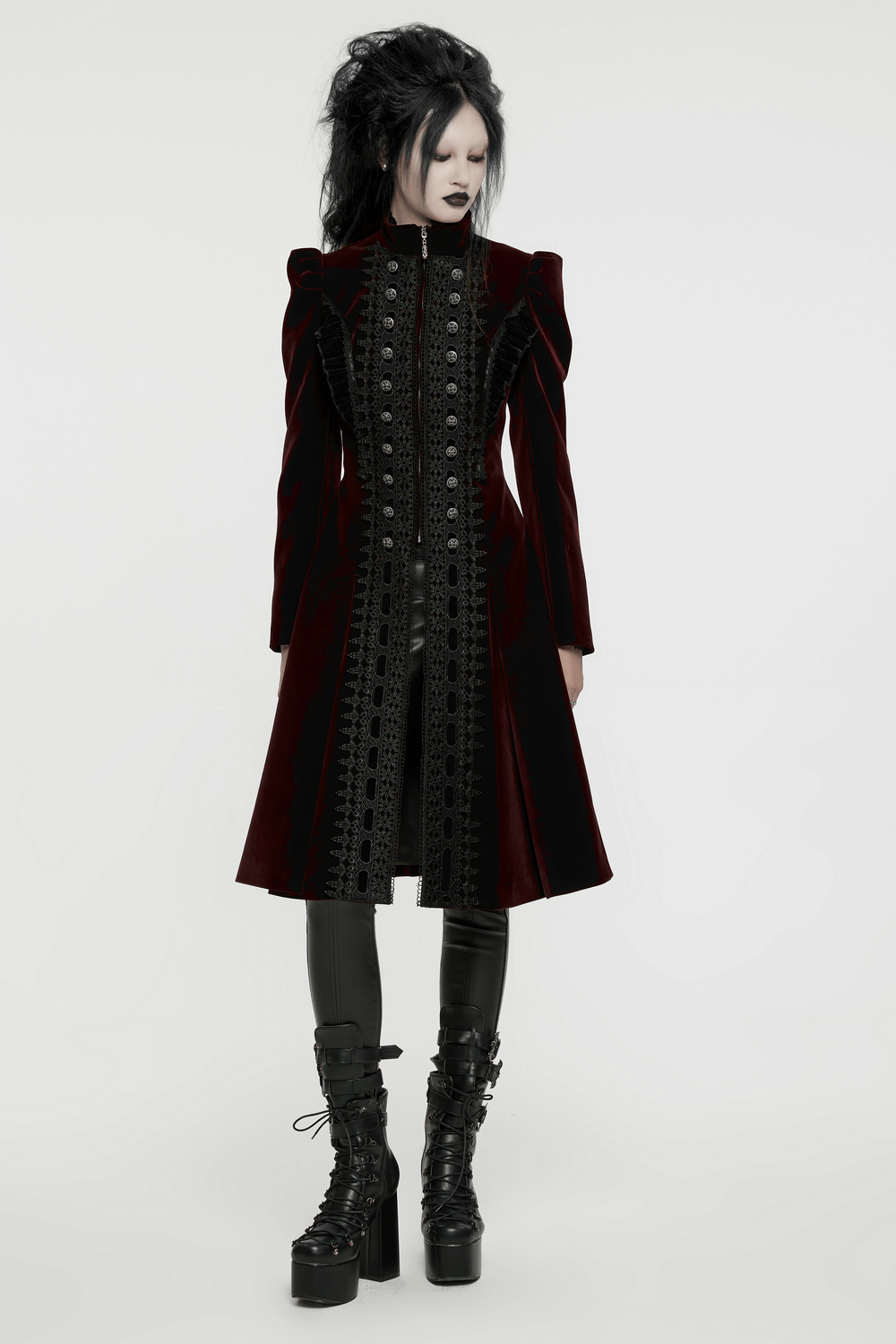 Elegant velvet Gothic coat with lace and ruffle details, featuring exquisite button accents and dramatic A-line silhouette.