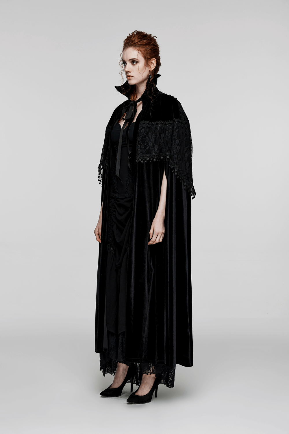 Elegant Gothic daily cloak in velvet with lace details showcased by a model, radiating dark elegance and allure.