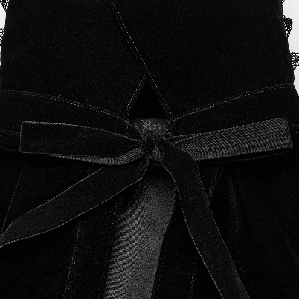 Close-up of the elegant velvet cloak's tie rope and lace detailing, showcasing gothic fashion elements.