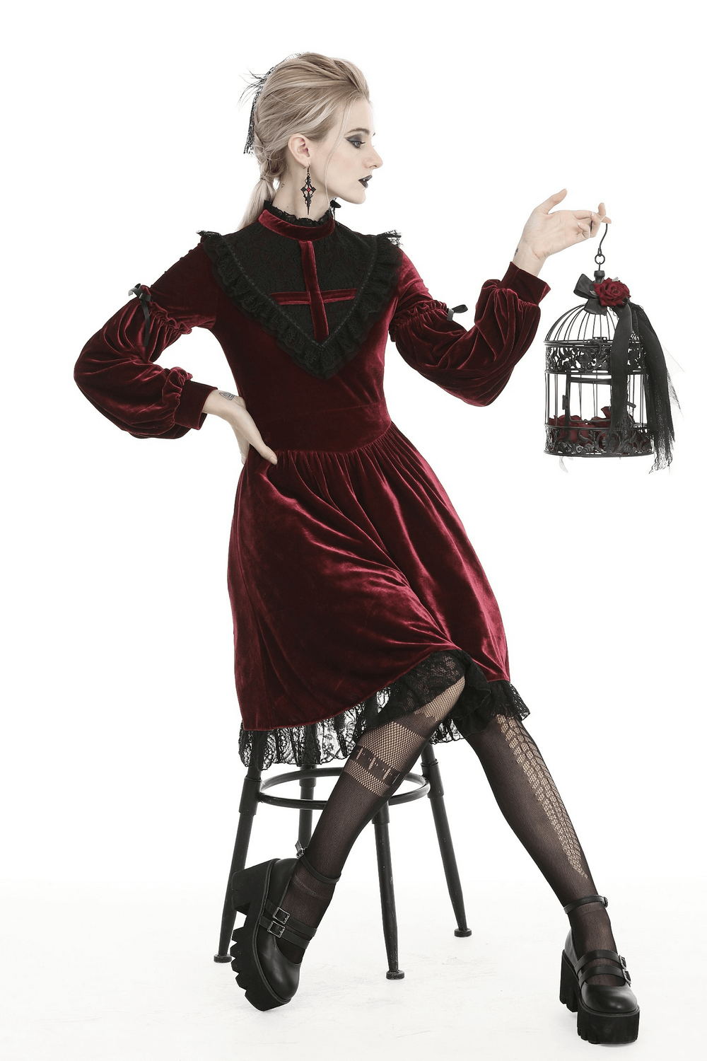 Elegant red velvet Gothic dress with lace detail, perfect for a Victorian-inspired look.