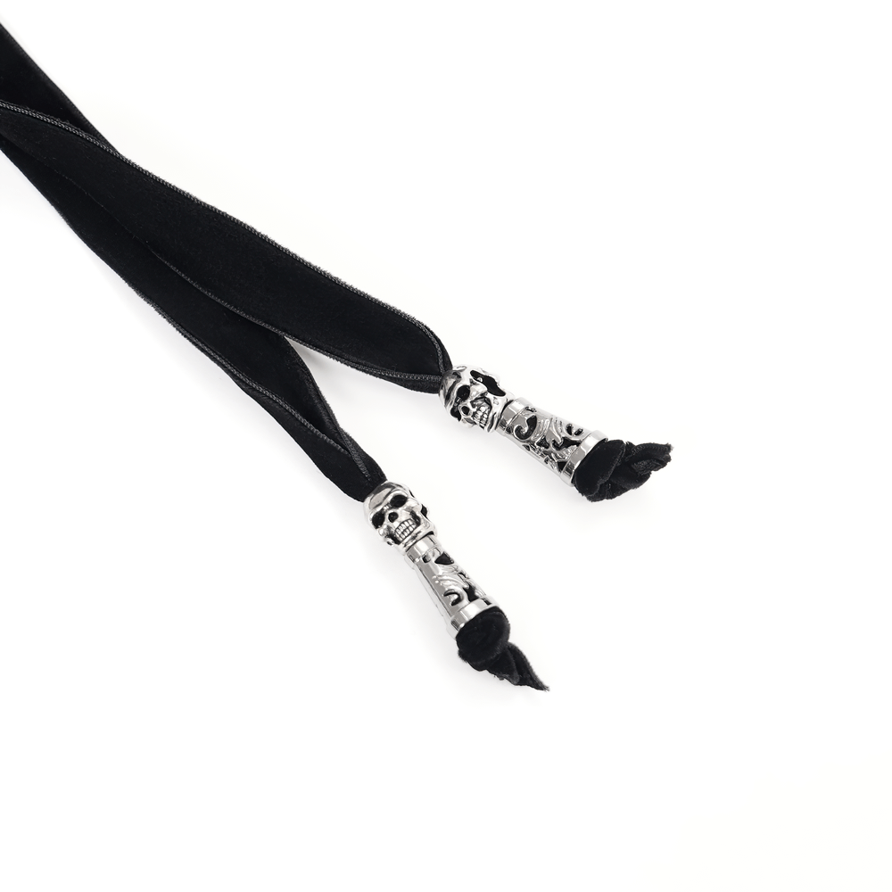 Elegant black velvet ribbon with ornate silver skull tassels for gothic styling and accessories.