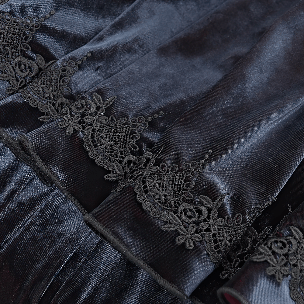 Close-up of luxurious black velvet fabric with intricate lace detailing, perfect for gothic fashion and vampiric capes.