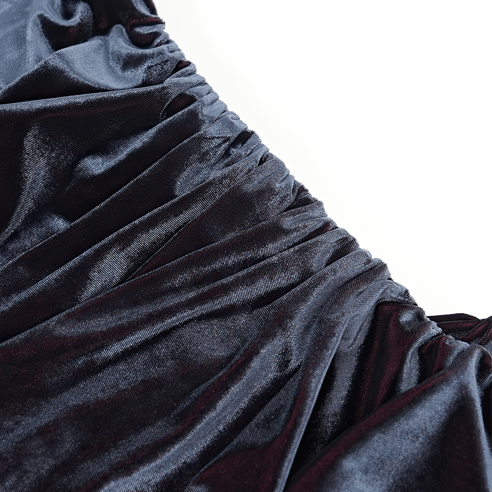 Close-up of luxurious velvet fabric showcasing rich texture and elegant draping, perfect for gothic fashion.