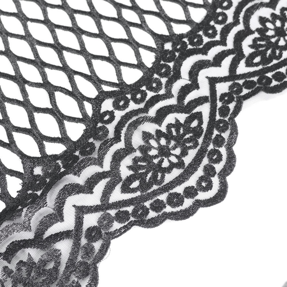 Close-up of intricate black lace fabric with floral patterns, perfect for gothic or Victorian styles.