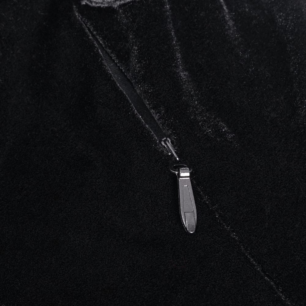 Close-up of the elegant velvet dress zipper detail, showcasing luxurious texture and chic design.