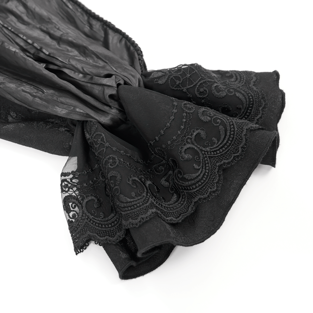 Elegant black lace sleeve detail of a Victorian gothic shirt for men, featuring intricate stitching and flared design.