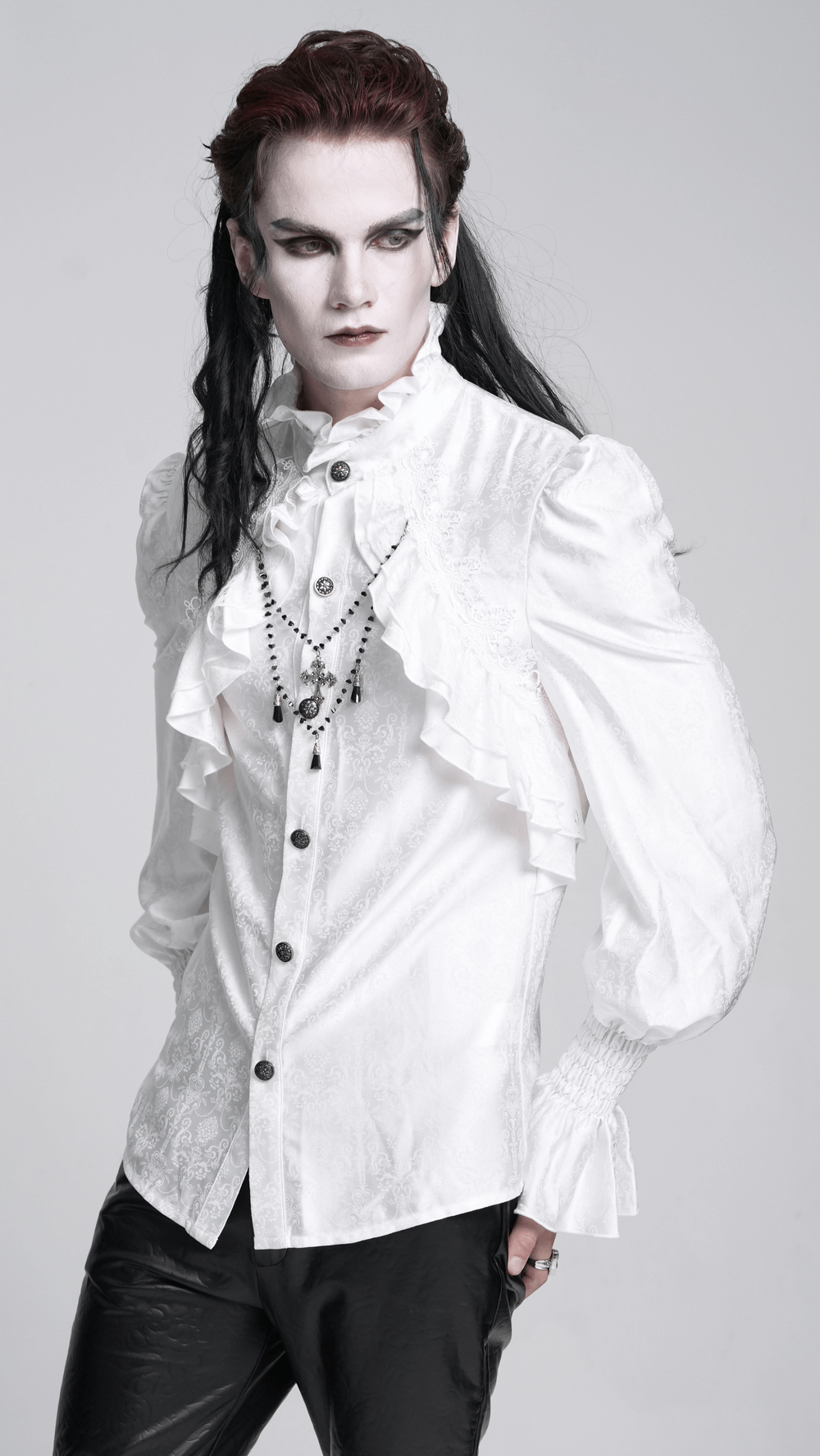 Elegant Victorian Gothic ruffled white shirt worn by a model with dark makeup, perfect for steampunk and cosplay styles.