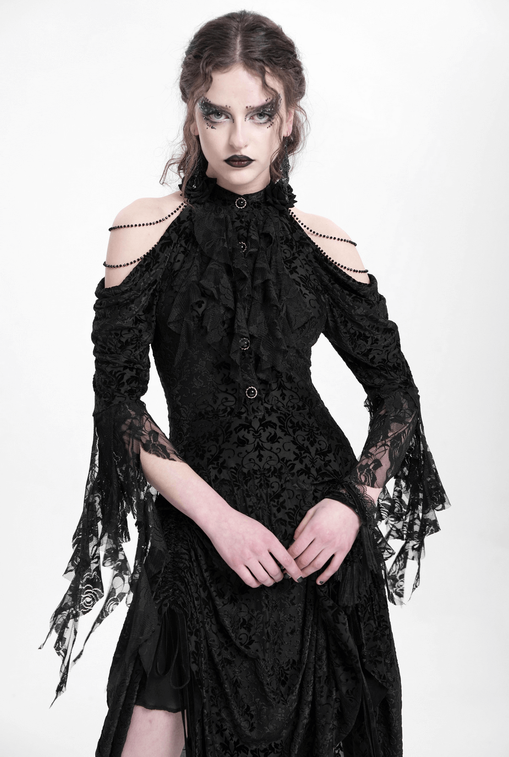 Elegant Gothic Victorian dress with ruffles and lace sleeves, perfect for a dark romantic aesthetic.
