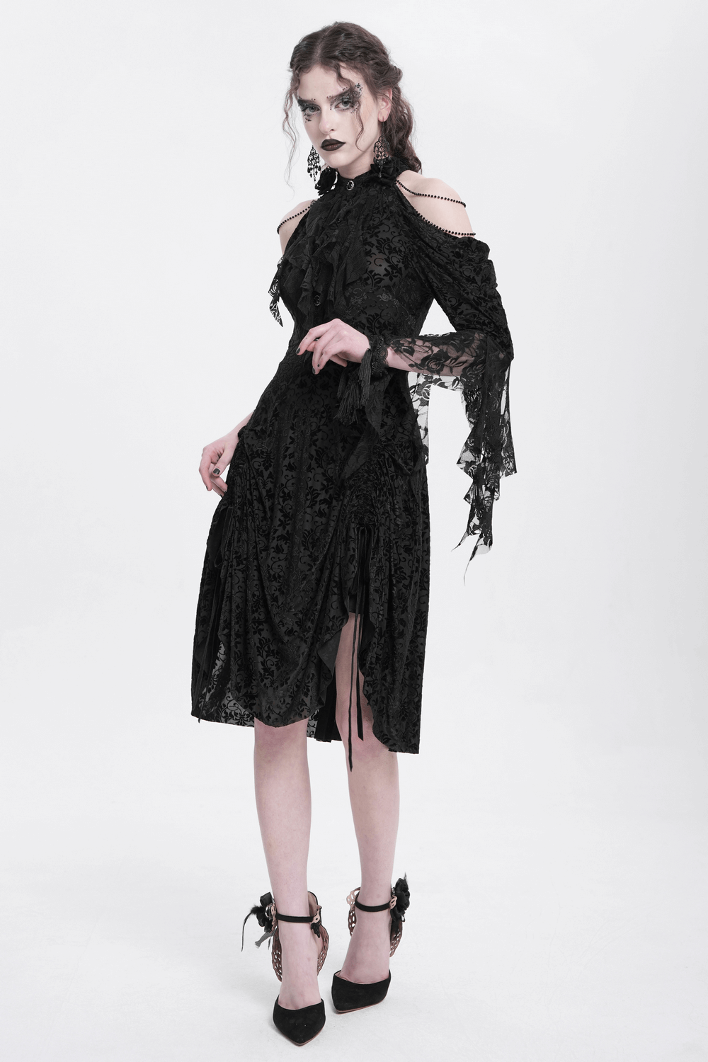 Elegant Gothic Victorian lace dress with ruffles, showcasing a dark romantic aesthetic and dramatic silhouette.