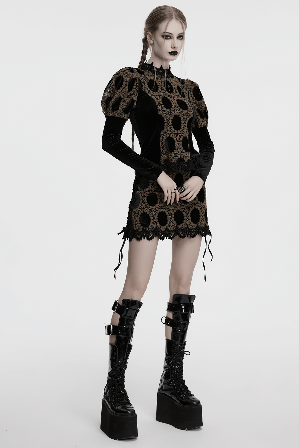 Elegant Victorian lace velvet top with bubble sleeves, featuring a unique design and bold black knee-high boots.