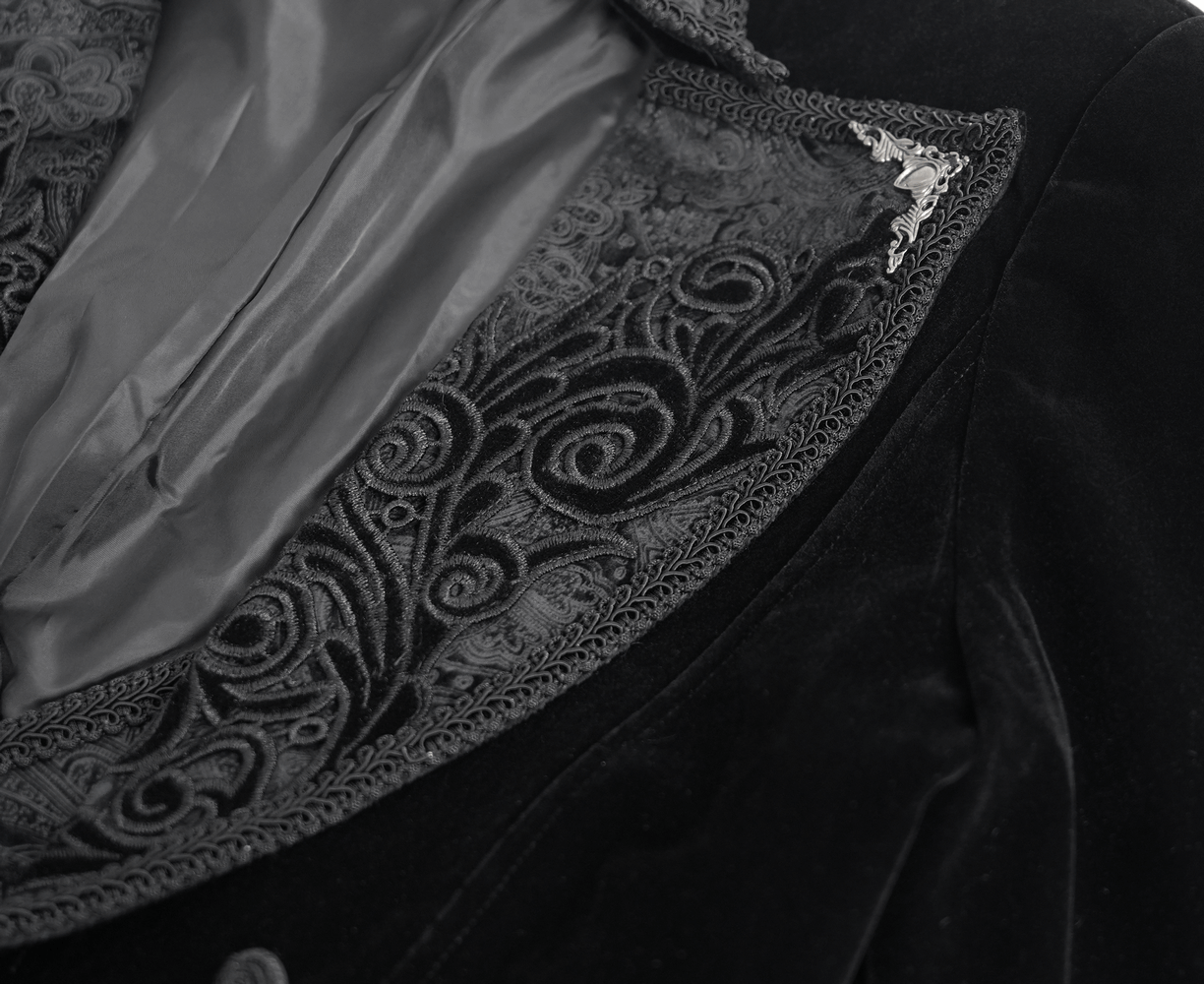 Intricate embroidered lapels of a luxurious Victorian tailcoat showcasing ornate brocade details.