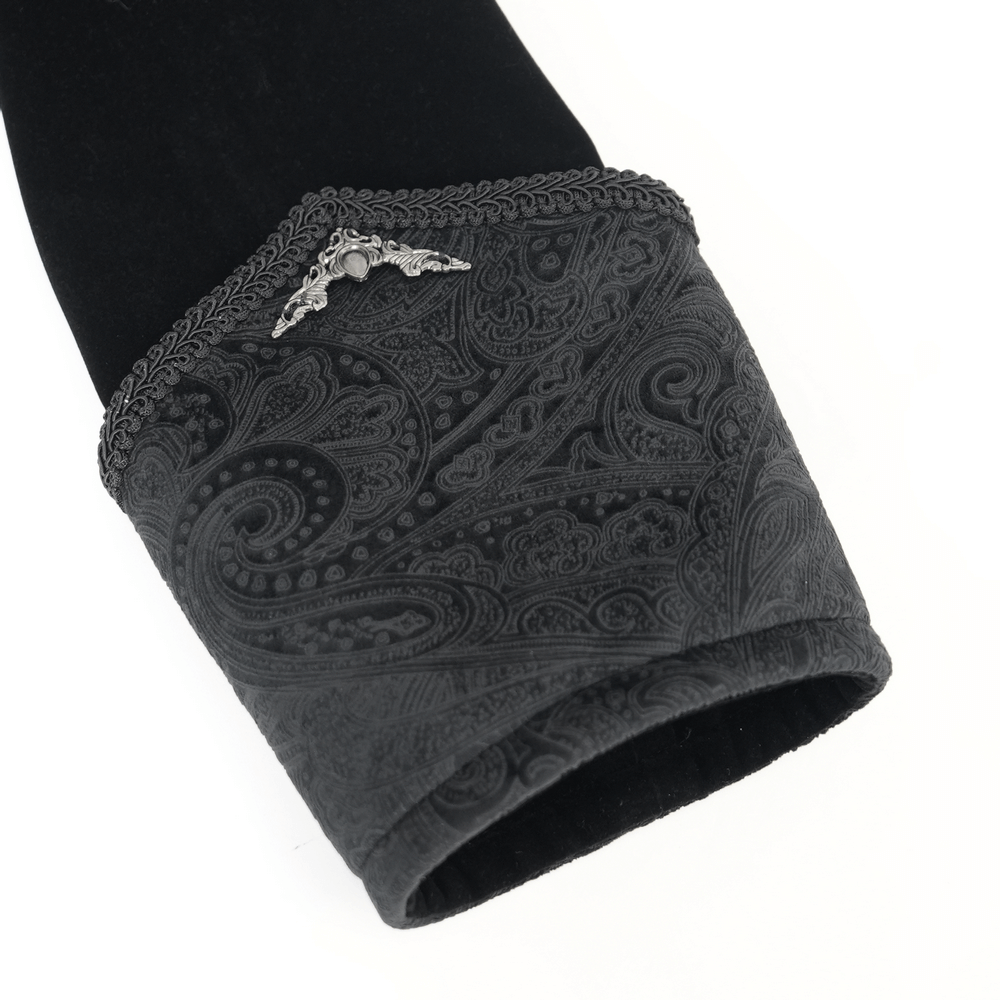 Elegant black velvet cuff with intricate brocade detailing and ornate silver embellishment, perfect for Victorian style.