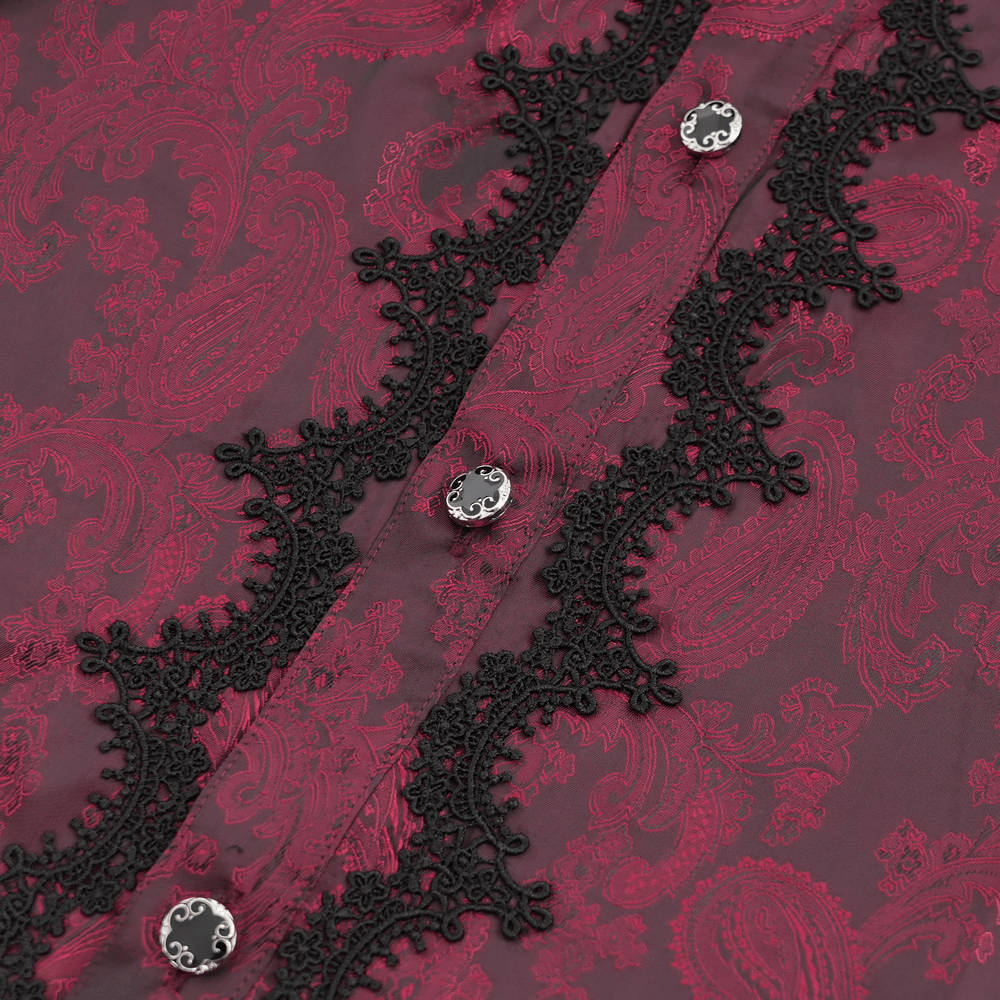 Close-up of elegant wine red ruffled lace shirt with black lace trim and decorative buttons.