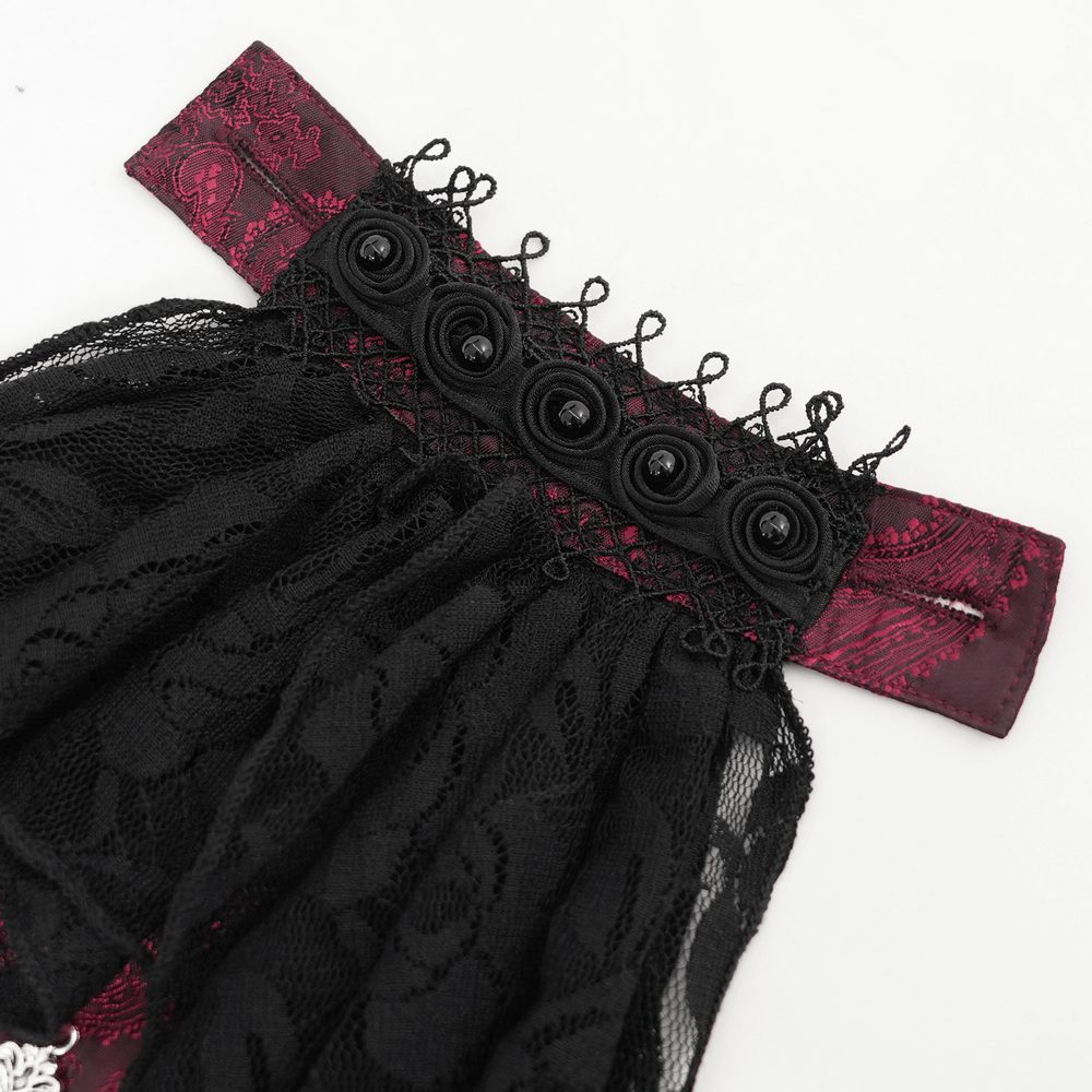 Close-up of the elegant Victorian wine red shirt's lace, ruffles, and decorative buttons for a gothic look.