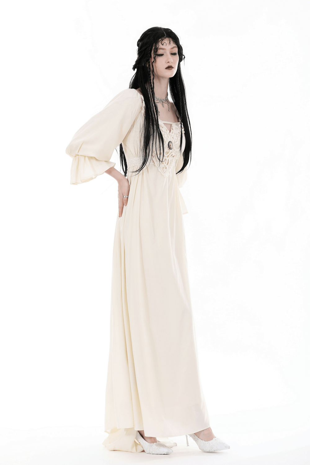 Elegant vintage long sleeves maxi dress with lace detail in delicate ivory, perfect for romantic evenings.