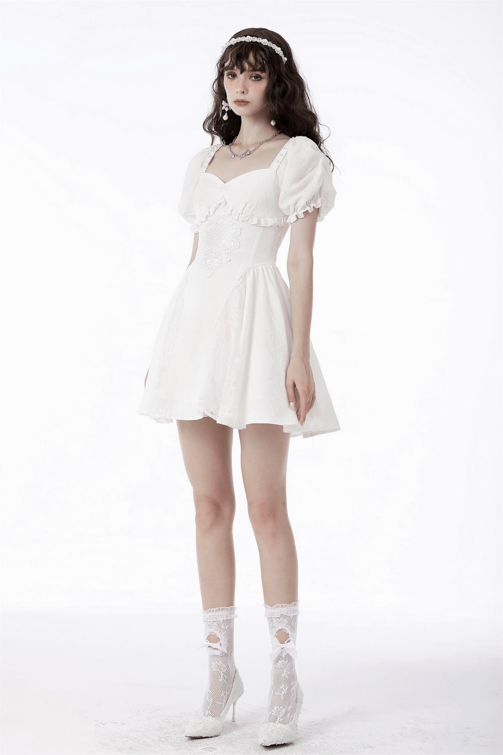 Elegant white dress with lace detail, puff sleeves, and floral embroidery, perfect for weddings and special occasions.