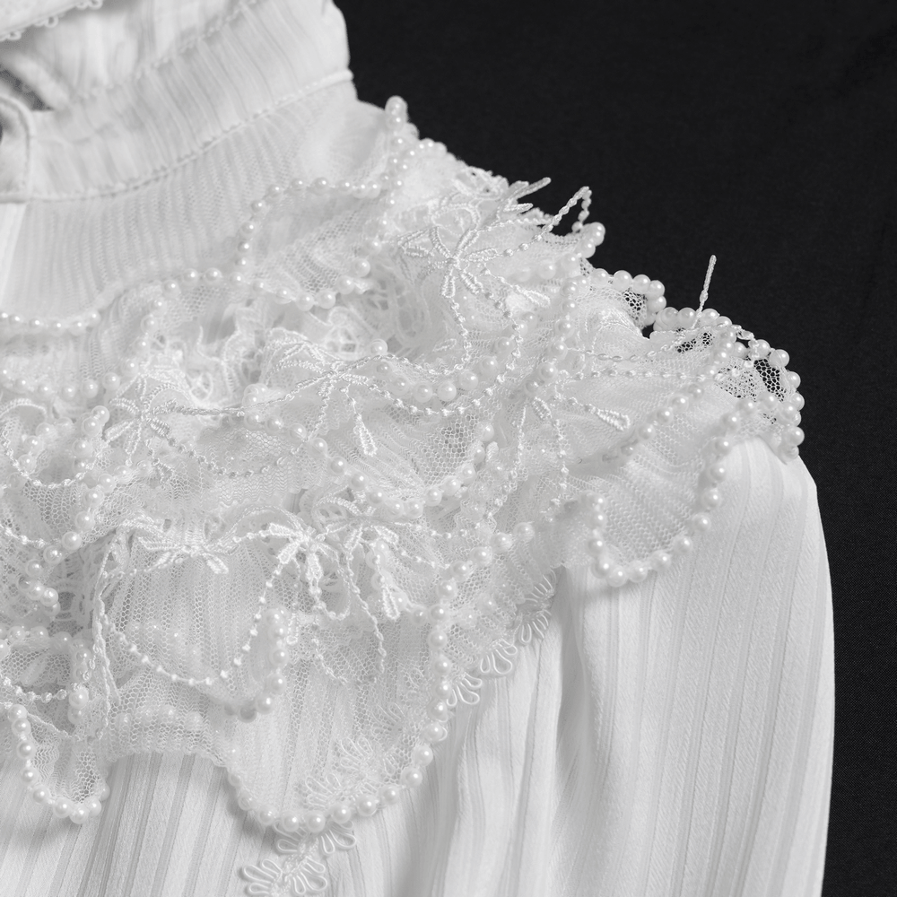 Elegant White Gothic Victorian Ruffle Sleeve Blouse with intricate lace and pearl embellishments on the shoulder.