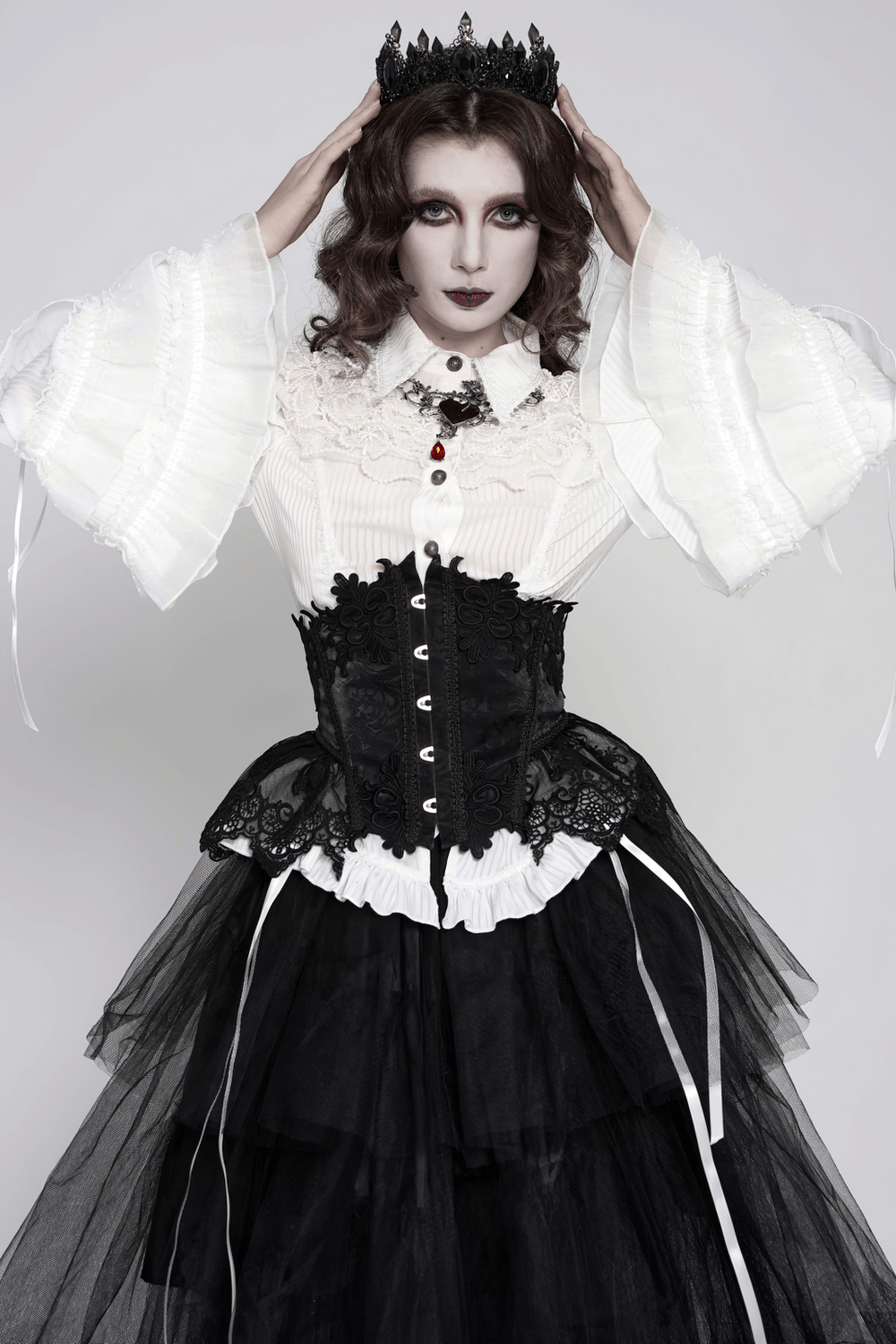 Elegant White Gothic Victorian Ruffle Sleeve Blouse styled with a black corset and dramatic layered skirt.