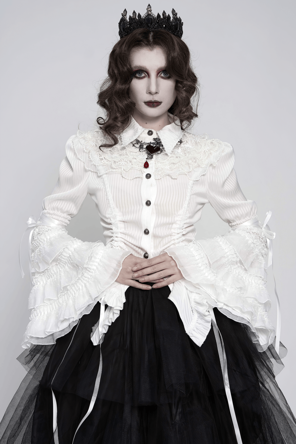 Elegant White Gothic Victorian Ruffle Sleeve Blouse worn with a dramatic black tulle skirt and a crown, showcasing ornate style.