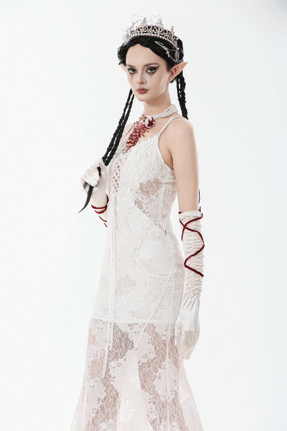 Elegant White Lace Gothic Dress with Spaghetti Straps worn by a model showcasing intricate lace design.