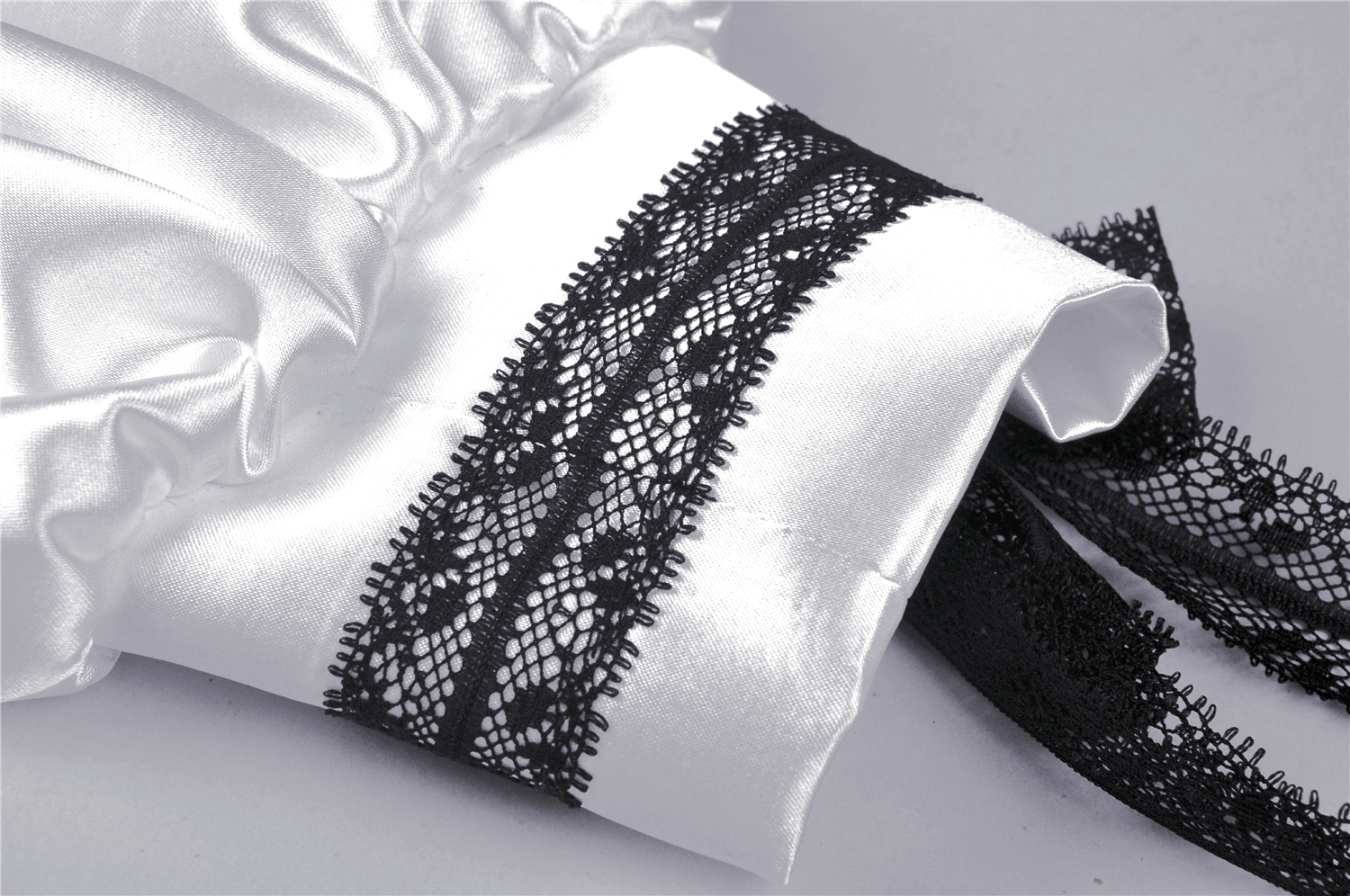 Elegant White Satin Dress with Black Lace Detailing