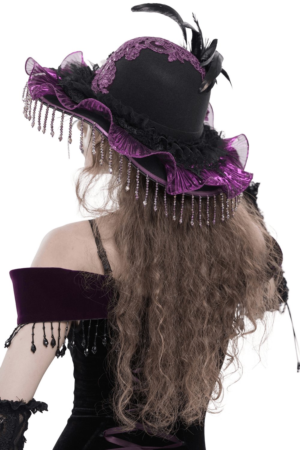 Elegant Wide Brim Hat with Lace Cross and Bead Fringe worn backwards with flowing hair and dramatic lace detailing.