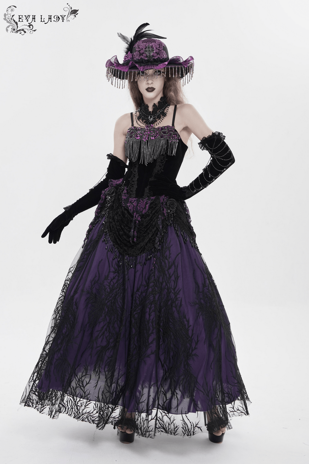Elegant Wide Brim Hat with Lace Cross and Bead Fringe worn by a model in a dramatic purple gothic gown.