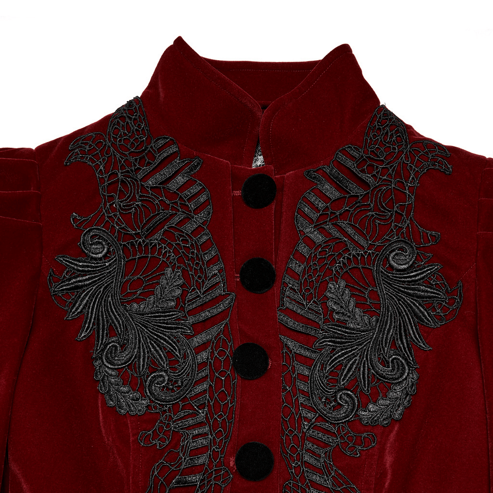 Close-up of elegant wine red gothic jacket with intricate black lace embroidery and decorative buttons.